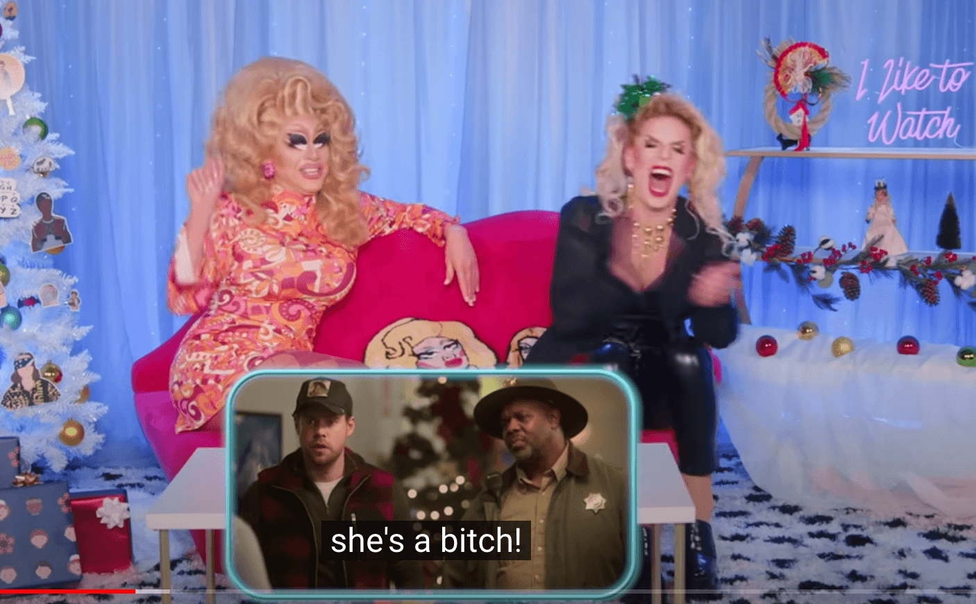 Screenshot from 'I like to watch" Youtube series showing drag queens Trixie and Katya saying "she's a bitch!"